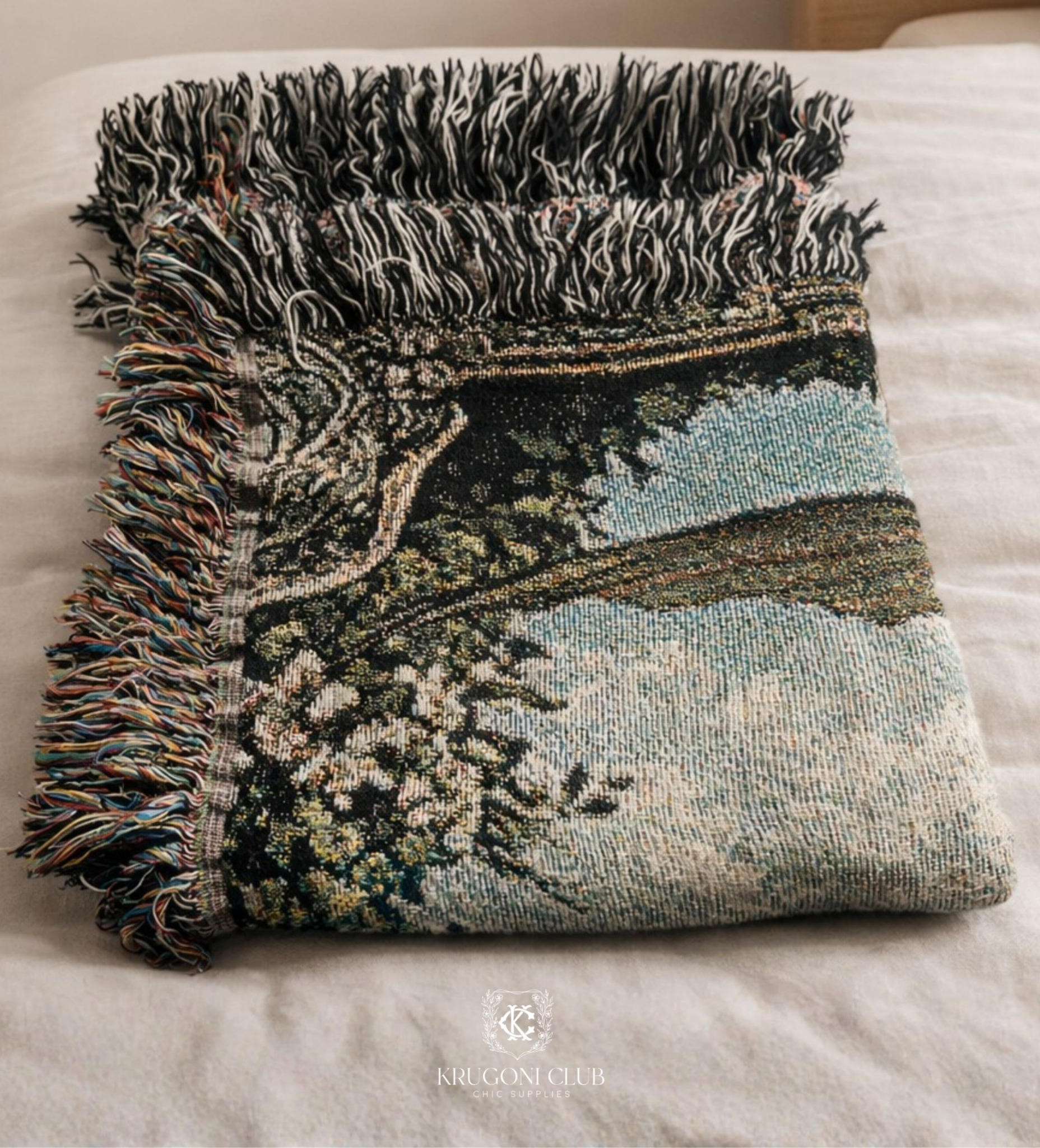 Close view of a medieval dragon jacquard woven blanket and its fringed texture